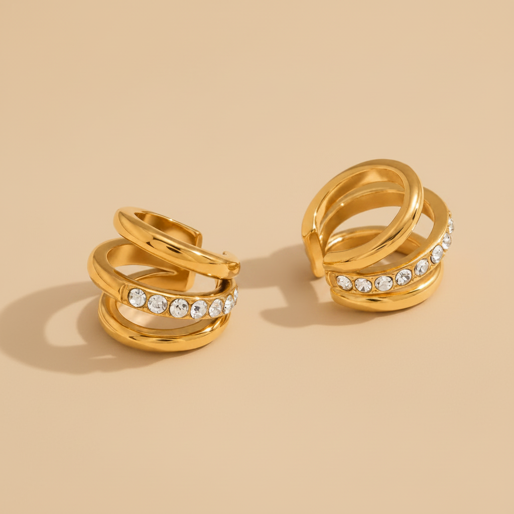Gold plated no piercing ear cuffs with inlayed zirconia stones by NIYANSA.