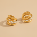Gold plated no piercing ear cuffs with inlayed zirconia stones by NIYANSA.