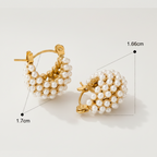 Gold plated huggies with pearl accents by NIYANSA