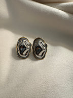 NIYANSA Molten Stud Earrings