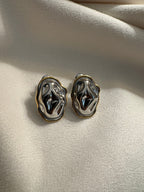 NIYANSA Molten Stud Earrings