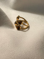 The Noor Cluster Stone Adjustable Ring made using 18kt gold pvd plated on 316L grade titanium steel.