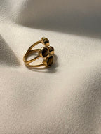 The Noor Cluster Stone Adjustable Ring made using 18kt gold pvd plated on 316L grade titanium steel.