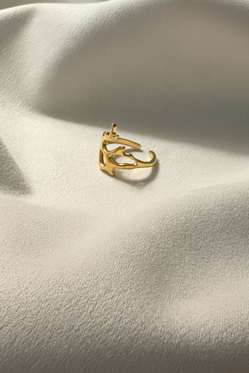 Aurelia Abstract Ring is made with 18kt gold PVD plated on 316L grade titanium steel. 