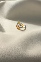 Aurelia Abstract Ring is made with 18kt gold PVD plated on 316L grade titanium steel. 