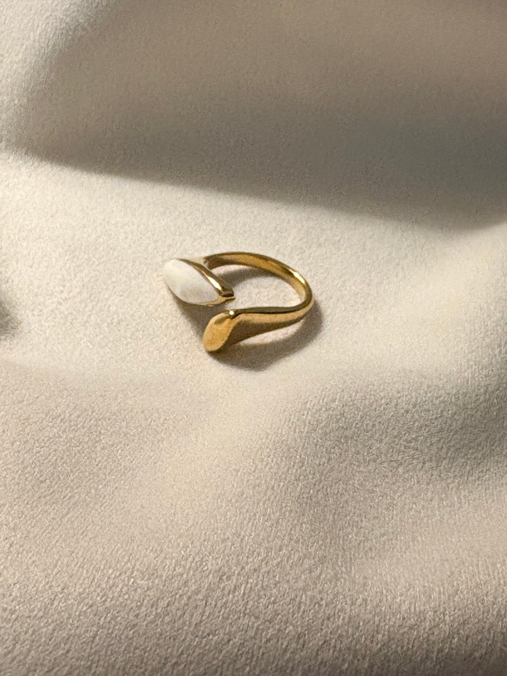Ira Enamel Petal Ring is made with 18kt gold PVD on 316L grade titanium steel.