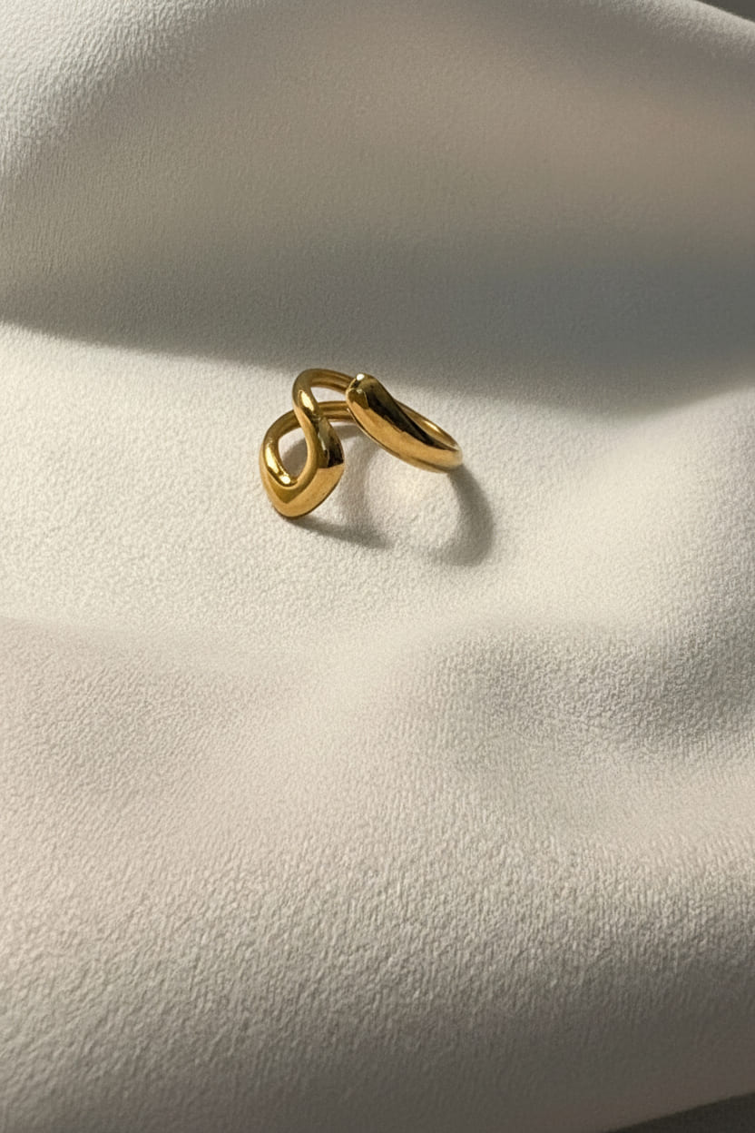 Anaya Dual Tone Infinity Ring is designed with 18kt gold pvd plated on 316L grade titanium steel.