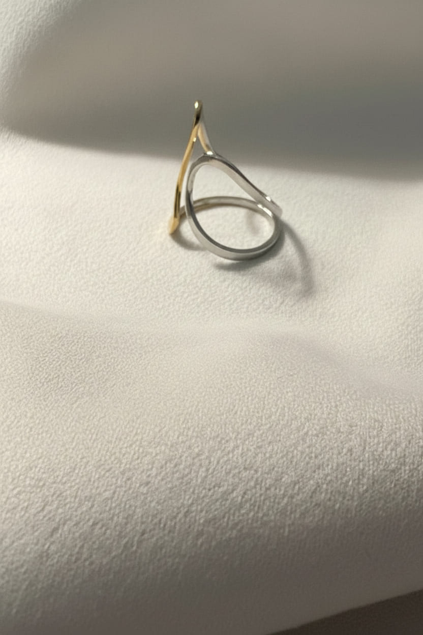 Ananta Dual Tone Infinity Ring is designed with 18kt gold pvd plated on 316L grade titanium steel.