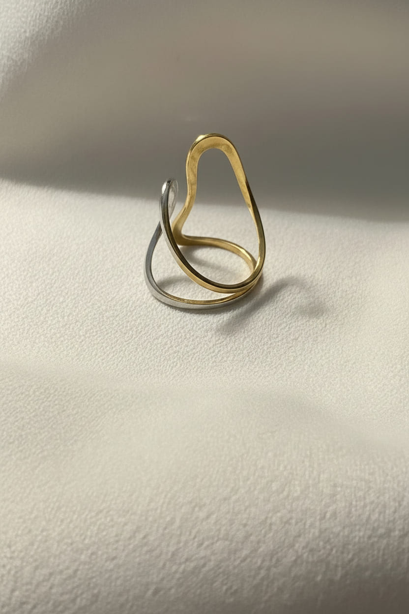  Ananta Sculpted Open Ring is made using 18kt gold pvd plated on 316L grade steel.