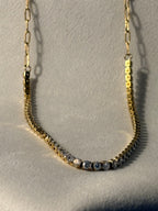 Tennis necklace with AAA cubic zirconia stones in 18KT PVD gold-plated stainless steel by NIYANSA.