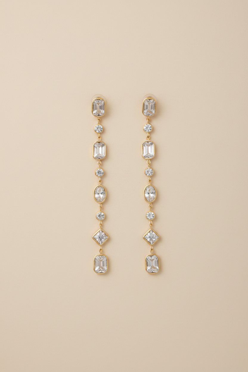18KT gold plated crystal drop earrings with multi-shaped stones in waterproof anti tarnish finish by NIYANSA.