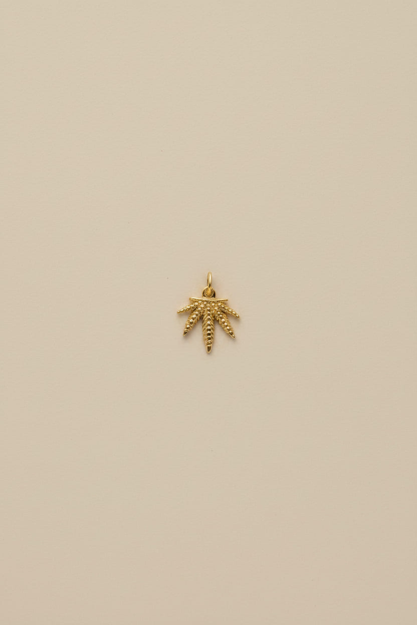 420 Leaf Pendant, crafted in 18kt gold plated on 316L grade titanium steel.