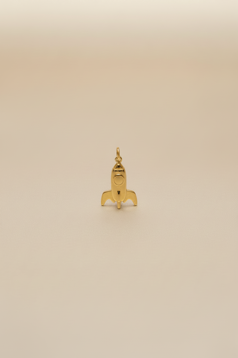 18kt Gold rocket ship coated on 316L grade stainless steel