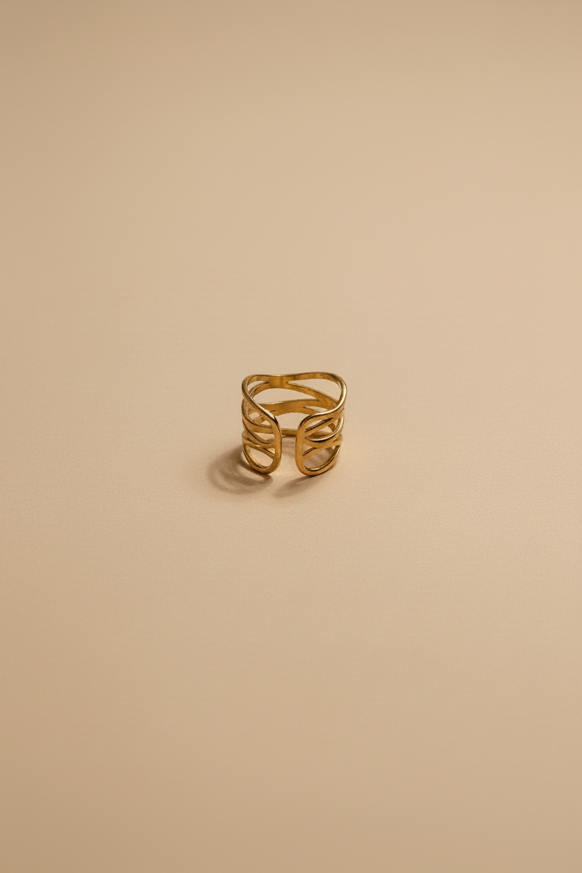 Minimalist gold ring with woven multi-band design in 18KT PVD gold plated stainless steel.