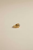Adjustable gold ring with AAA cubic zirconia in 18KT PVD gold plated stainless steel.