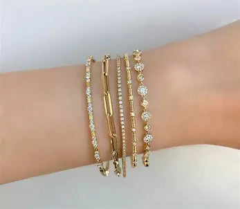 Soft curved design with a refined gold finish.